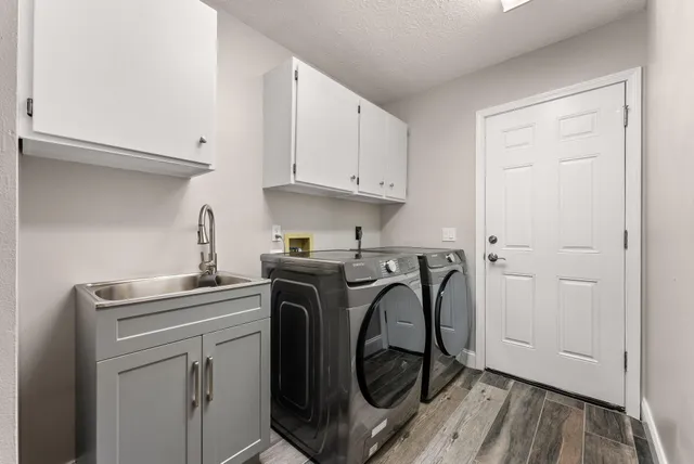 a utility room with dryer and washer