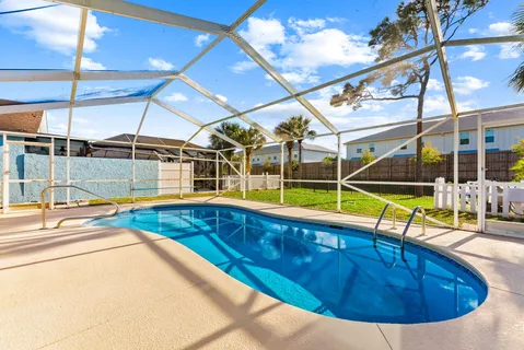 a view of a swimming pool with seating area