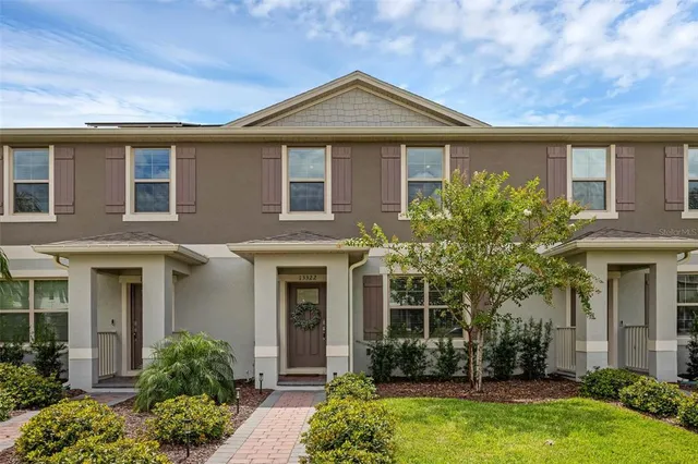 front view of a house with a yard