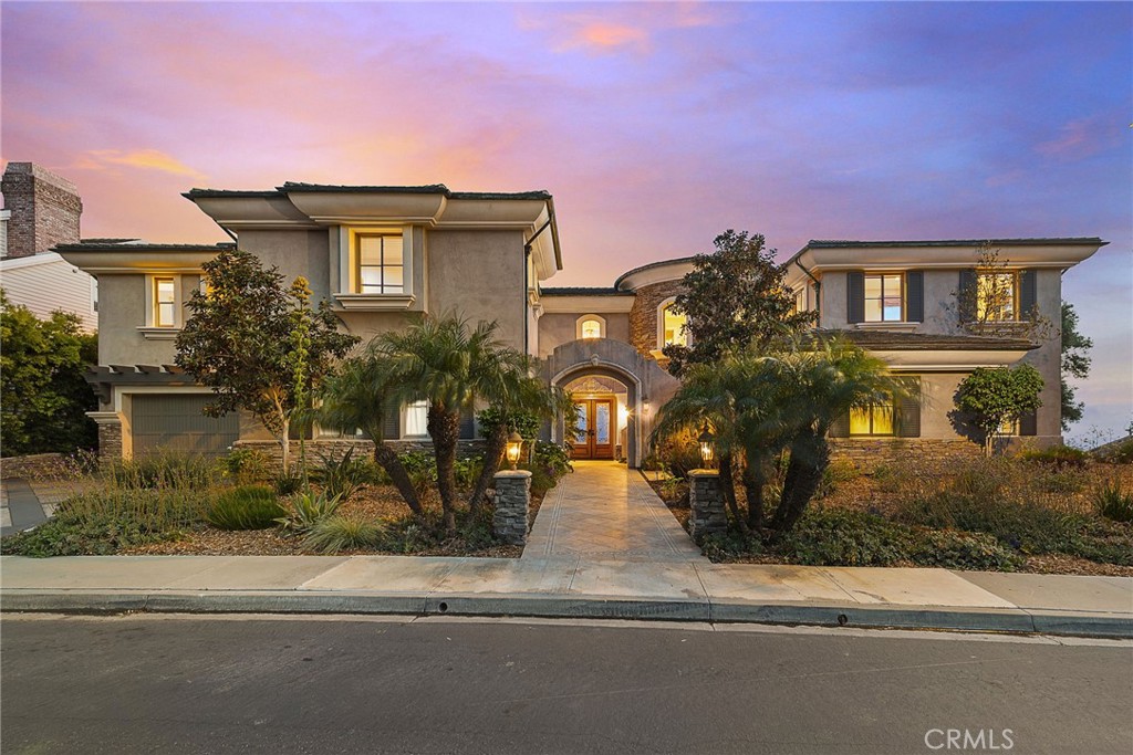 2009 Via Teca San Clemente, CA 92673 - Photo 12 of 52 a front view of a house with a yard