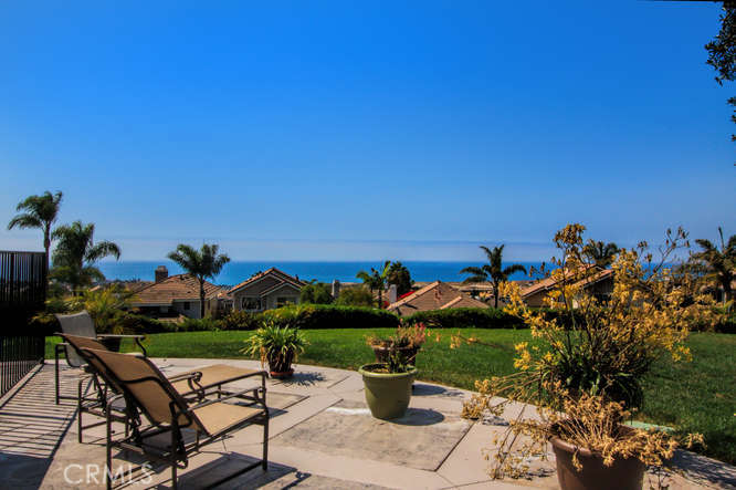 2009 Via Teca San Clemente, CA 92673 - Photo 19 of 52 a view of a patio with chairs and a table