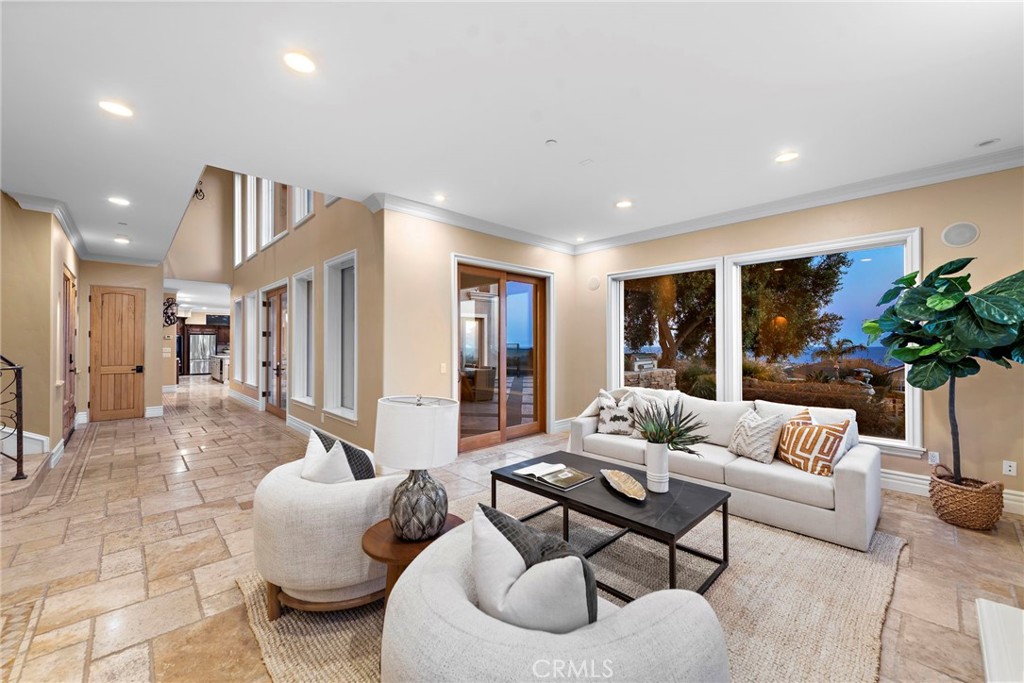 2009 Via Teca San Clemente, CA 92673 - Photo 26 of 52 a living room with furniture and a large window