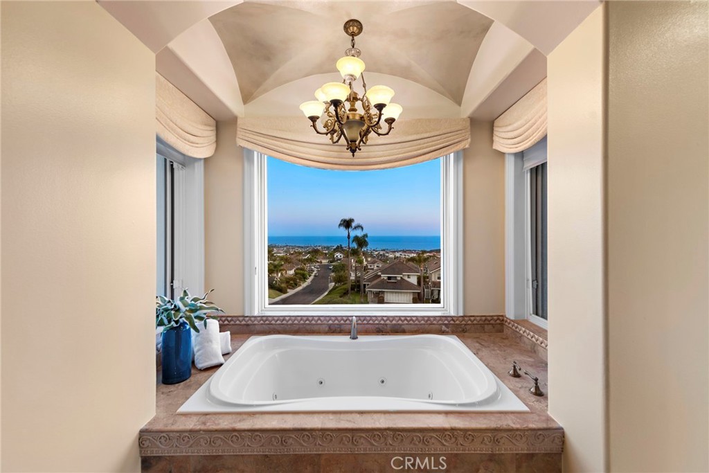 2009 Via Teca San Clemente, CA 92673 - Photo 30 of 52 a view of kitchen with a sink and chandelier