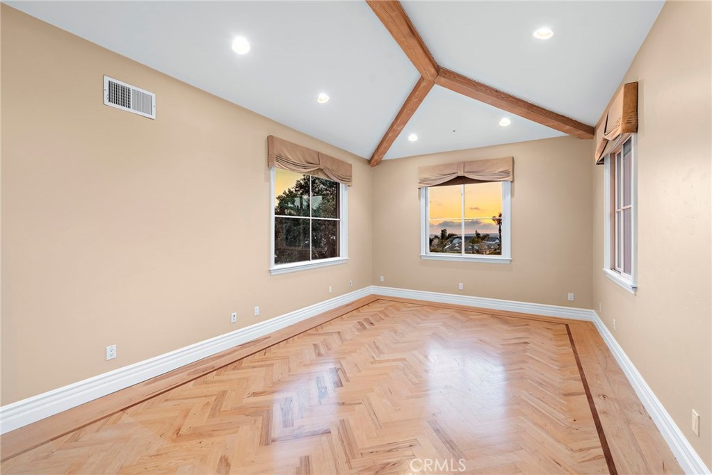 2009 Via Teca San Clemente, CA 92673 - Photo 34 of 52 Upper level guest room with vaulted ceiling.