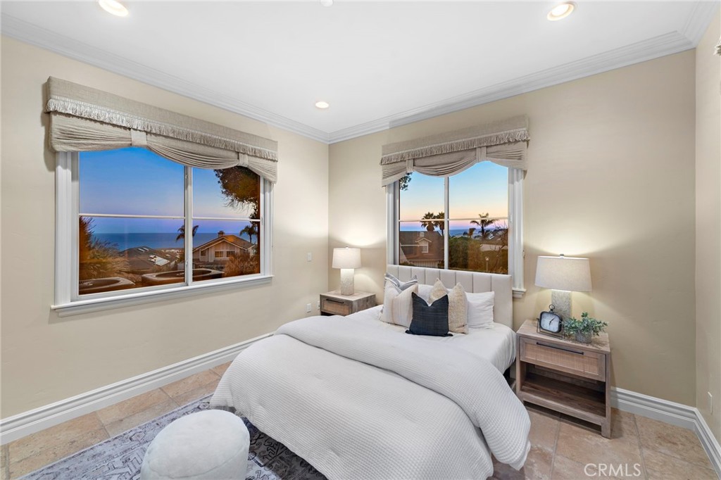 2009 Via Teca San Clemente, CA 92673 - Photo 35 of 52 a bedroom with a bed and a painting on the wall