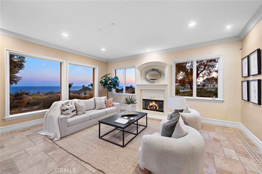 2009 Via Teca San Clemente, CA 92673 - Photo 5 of 52 Formal living room with fireplace and views