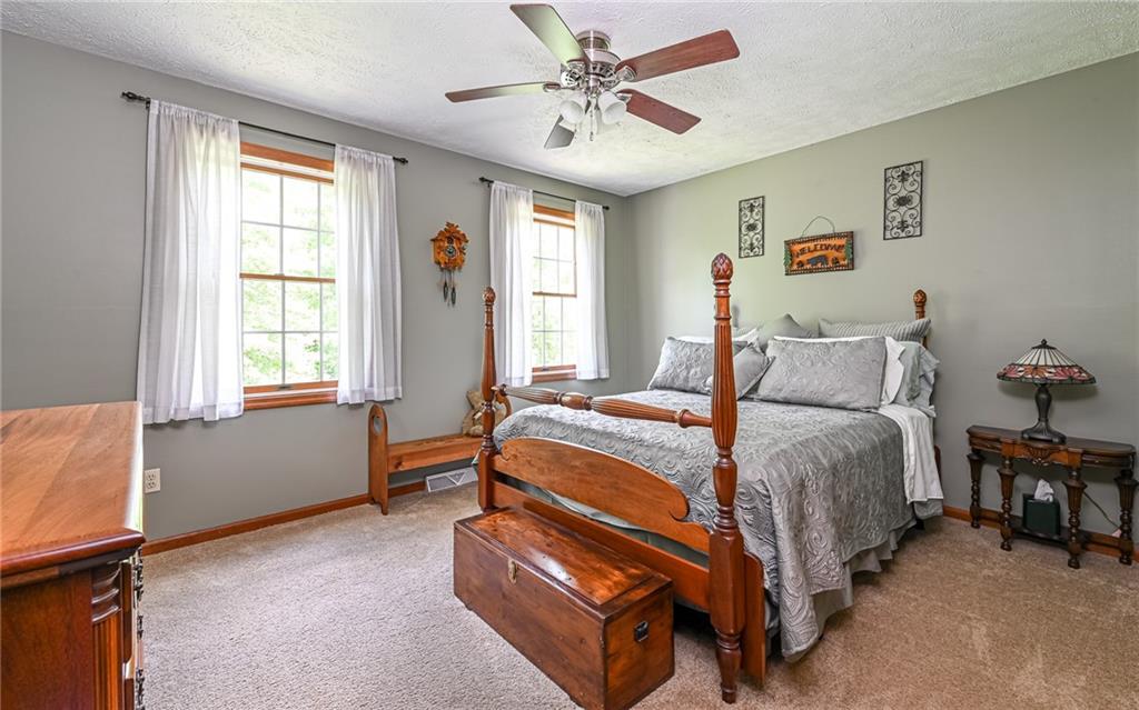 133 Miller Road Sarver, PA 16055 - Photo 26 of 50 a bed room with a bed and a window