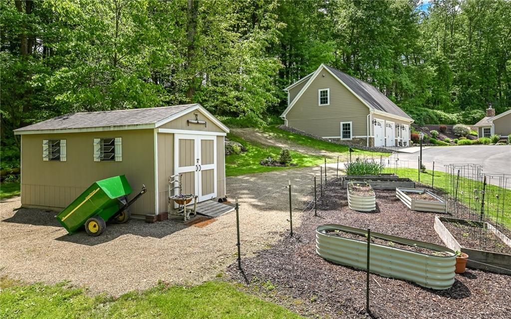 133 Miller Road Sarver, PA 16055 - Photo 32 of 50 a front view of a house with garden