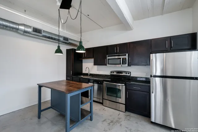 a view of street from balcony