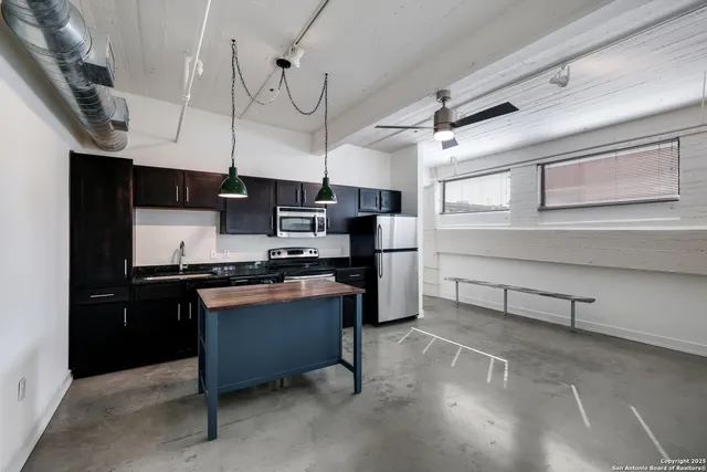 a room with furniture and flat screen tv