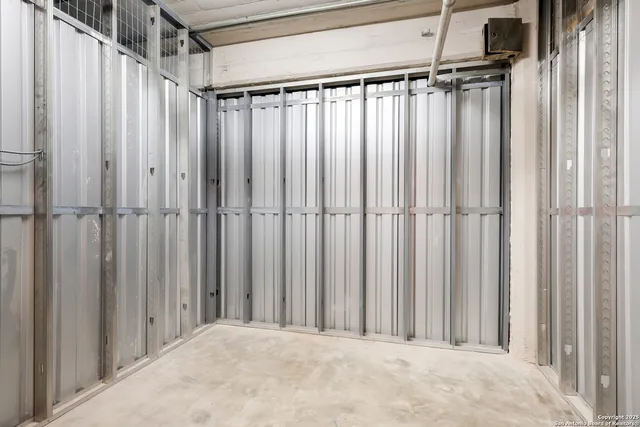 a view of swimming pool with seating space