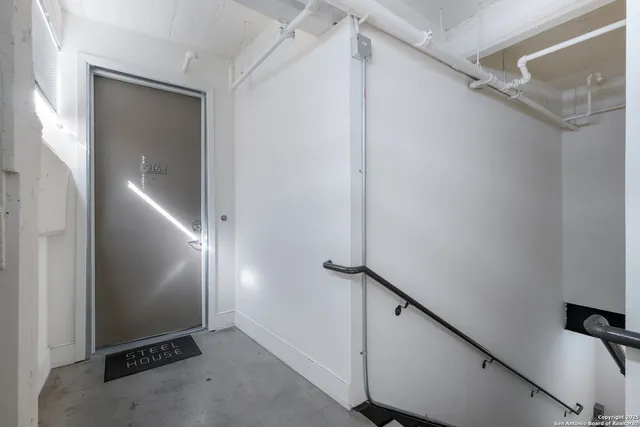 a view of a storage & utility room with lots of racks