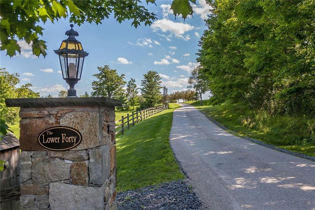 290 Northfield Road Litchfield, CT 06759 - Photo 1 of 1 a view of a pathway of a house with a yard