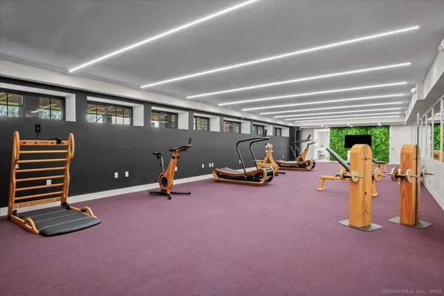 a view of room with furniture and a window