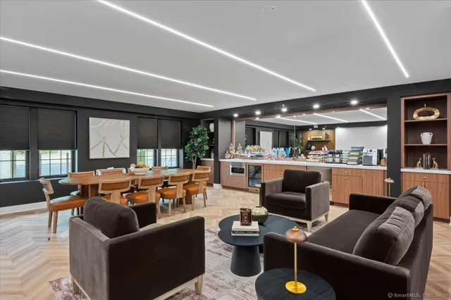 a outdoor living space with furniture and view of kitchen