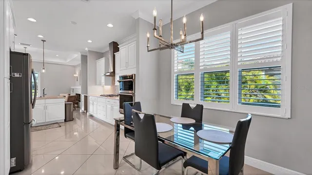 a spacious bedroom with a bed and a couch