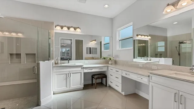 a room with a sink and a mirror