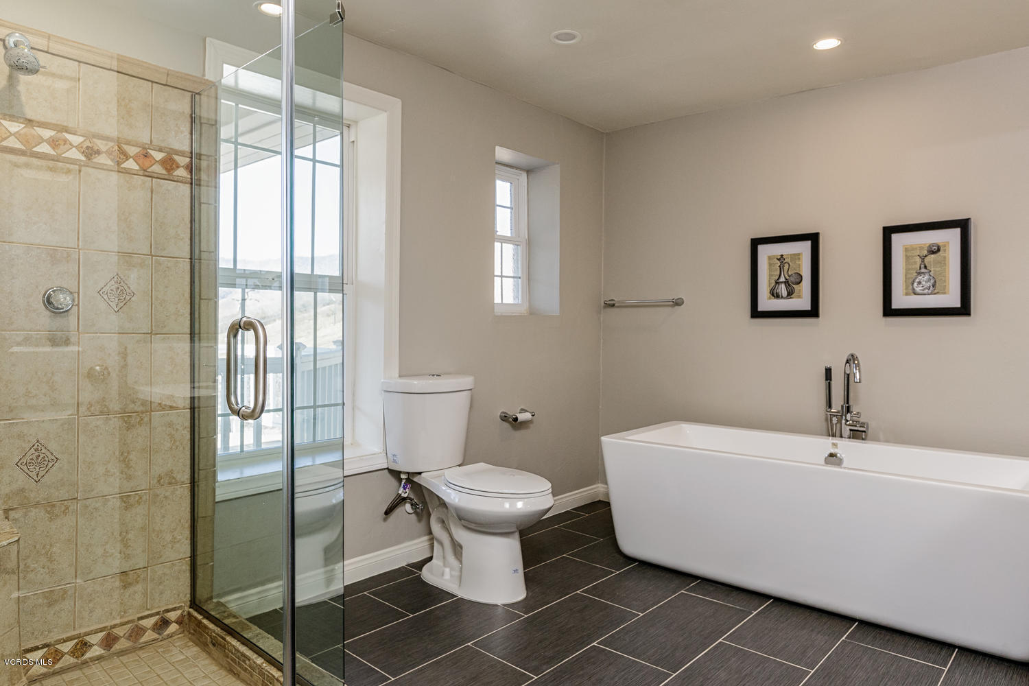 5829 Oak Knolls Road Simi Valley, CA 93063 - Photo 16 of 33 a bathroom with a toilet sink and a shower