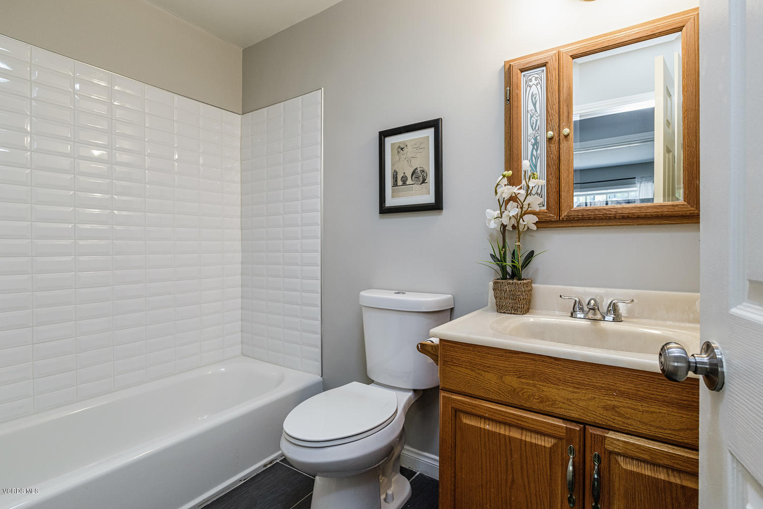 5829 Oak Knolls Road Simi Valley, CA 93063 - Photo 19 of 33 a bathroom with a sink toilet and shower