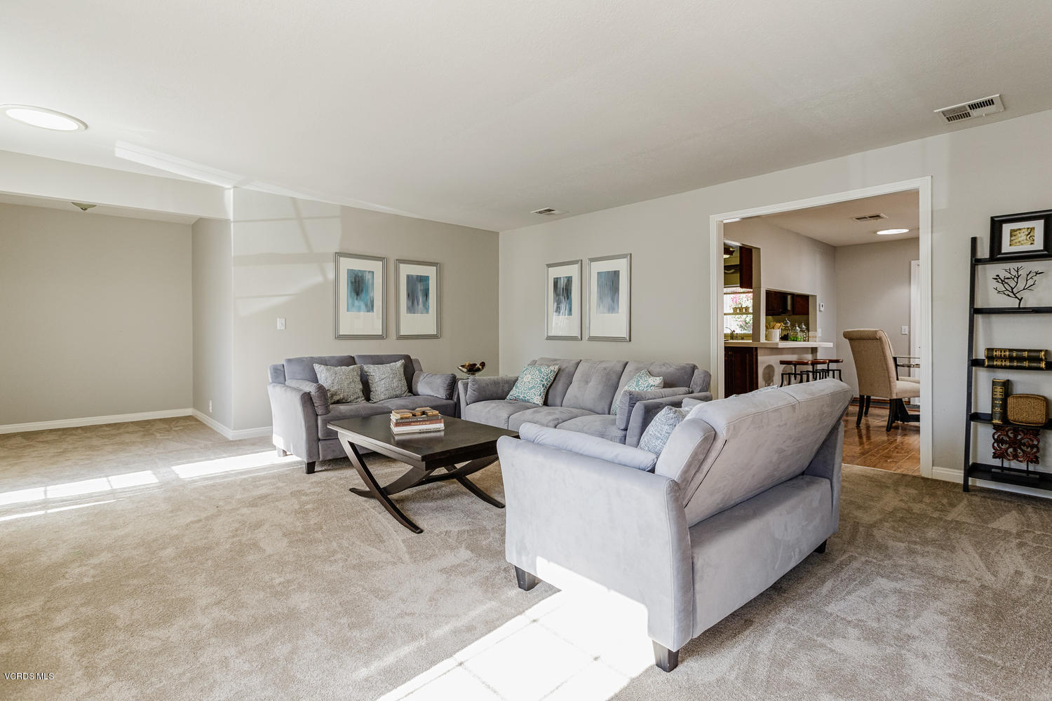 5829 Oak Knolls Road Simi Valley, CA 93063 - Photo 3 of 33 a living room with furniture and a couch
