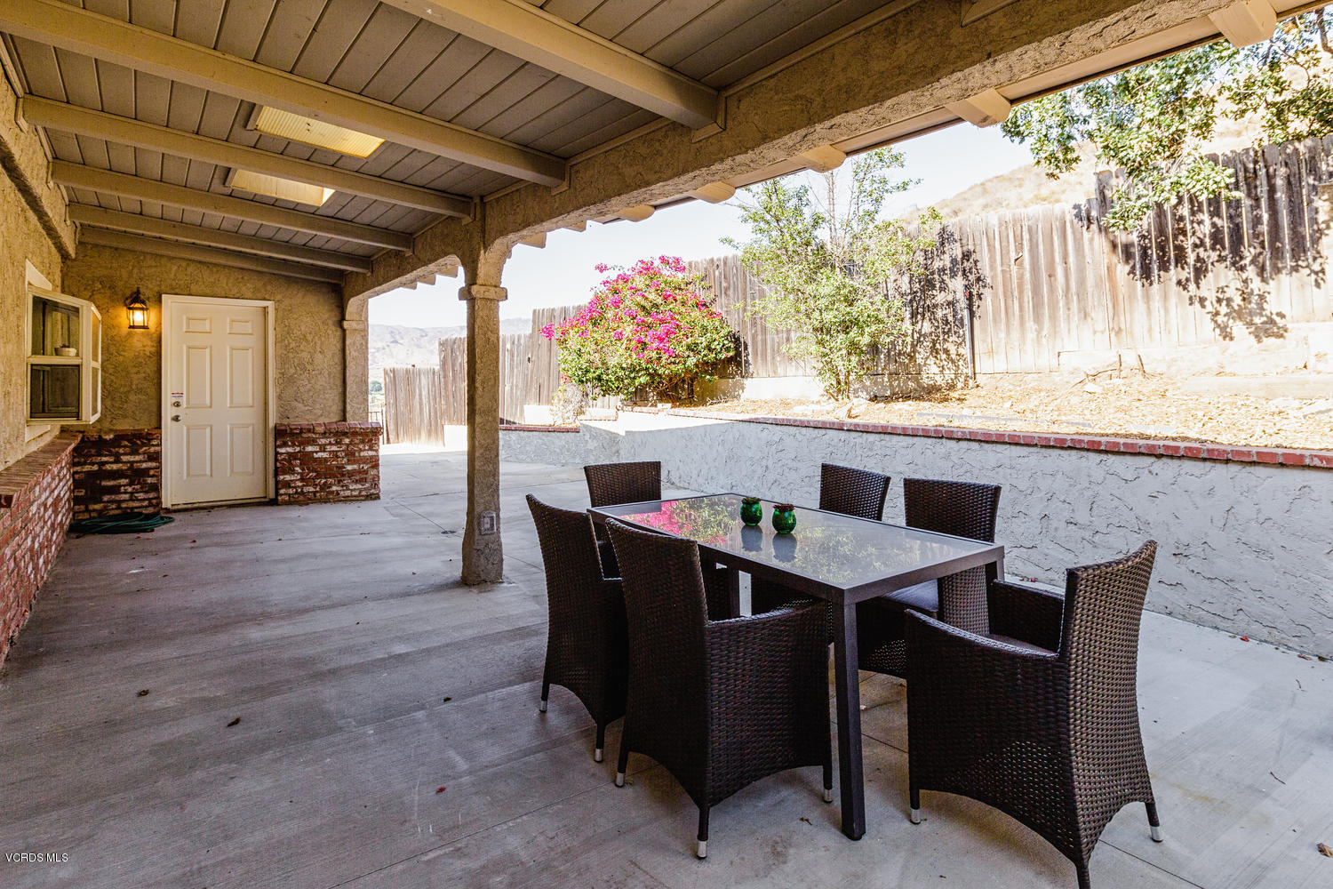 5829 Oak Knolls Road Simi Valley, CA 93063 - Photo 23 of 33 a outdoor dining space with furniture and outdoor view