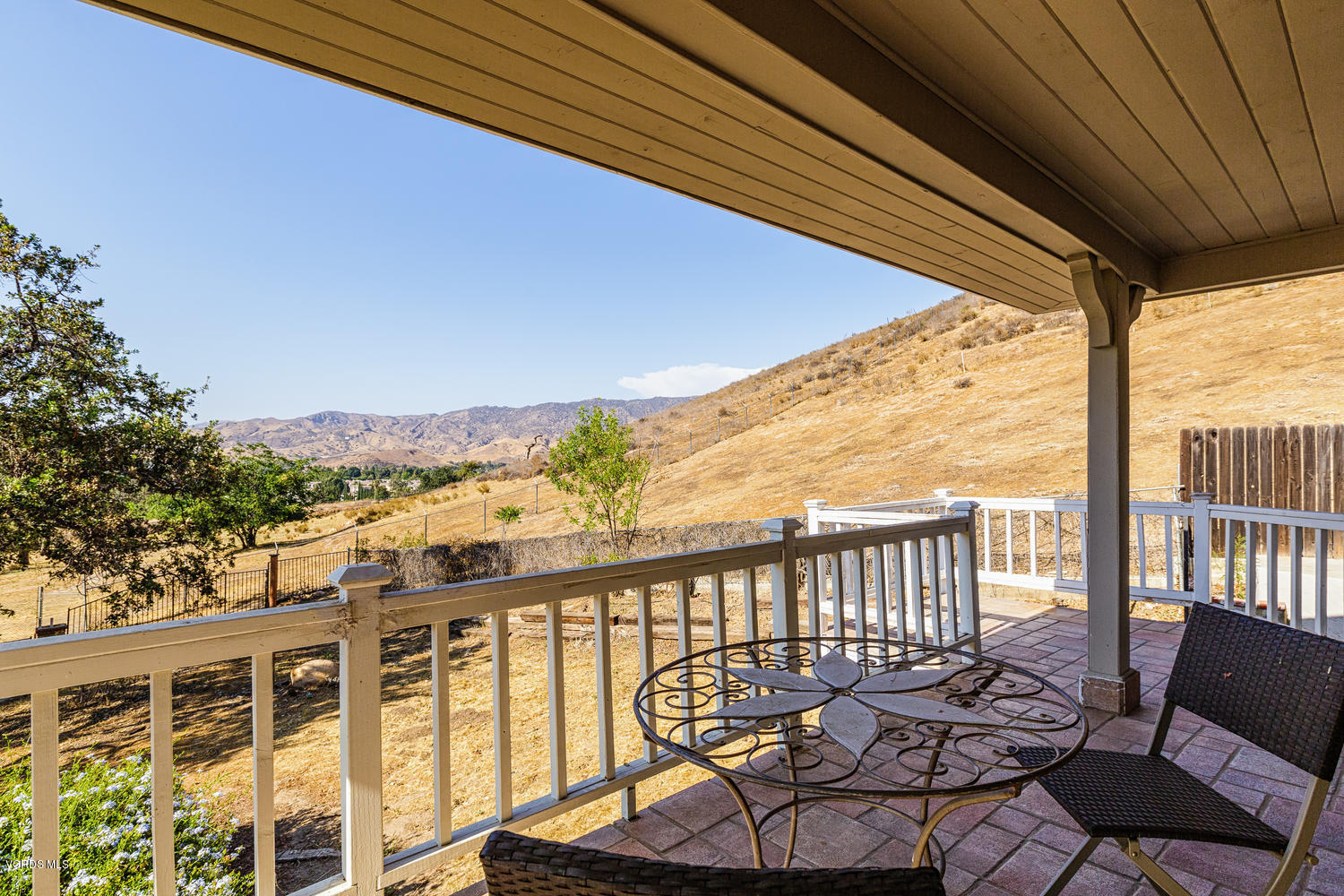 5829 Oak Knolls Road Simi Valley, CA 93063 - Photo 29 of 33 a view of a balcony with chairs
