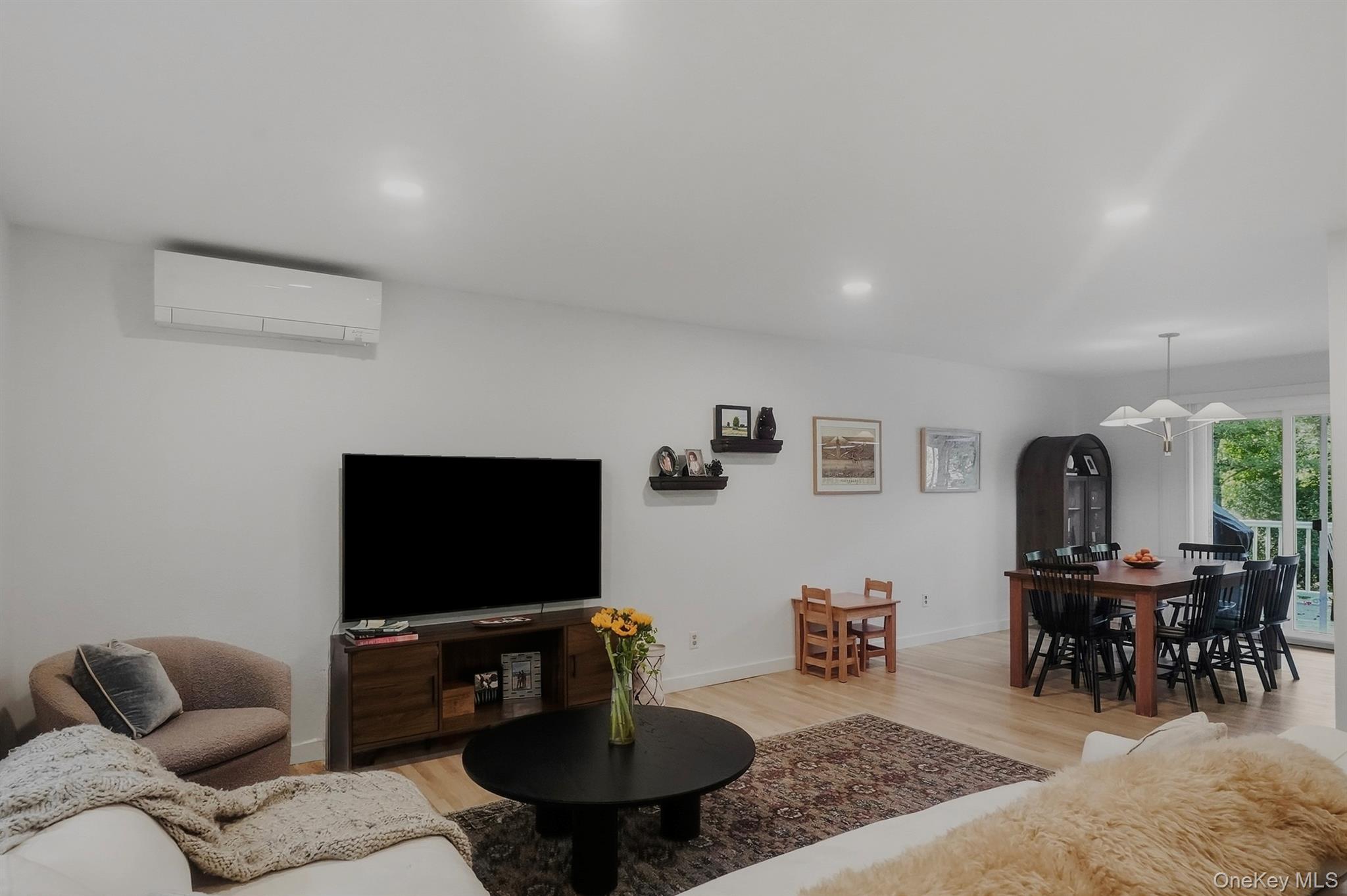 136 Hustis Road Cold Spring, NY 10516 - Photo 5 of 21 Family room with access to dining area and sliding doors to porch