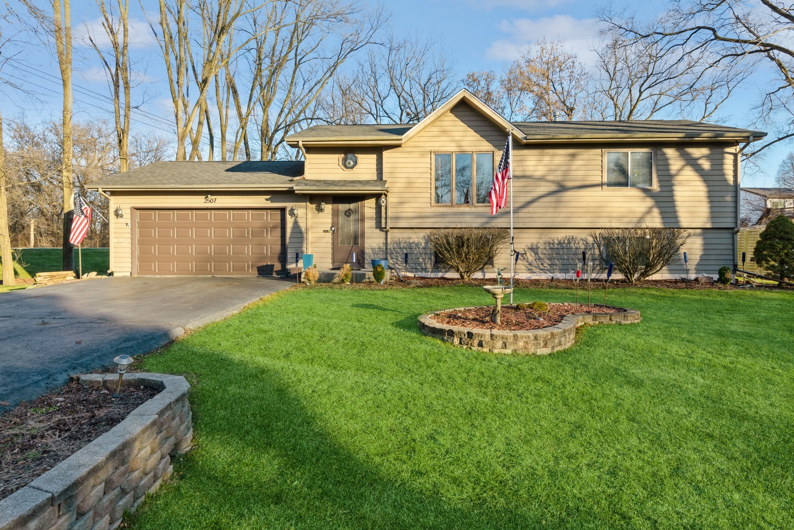 2507 Crystal Lake Road Cary, IL 60013 - Photo 1 of 18 front view of a house with a yard