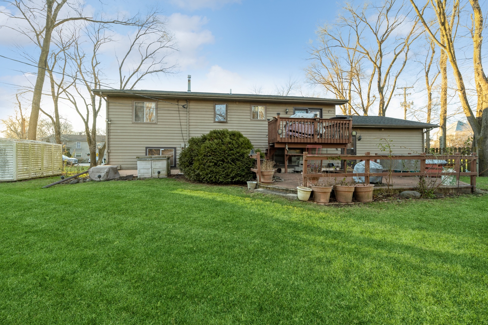 2507 Crystal Lake Road Cary, IL 60013 - Photo 17 of 18 a view of a house with backyard and a tree