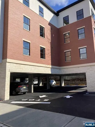 a view of a building with a street