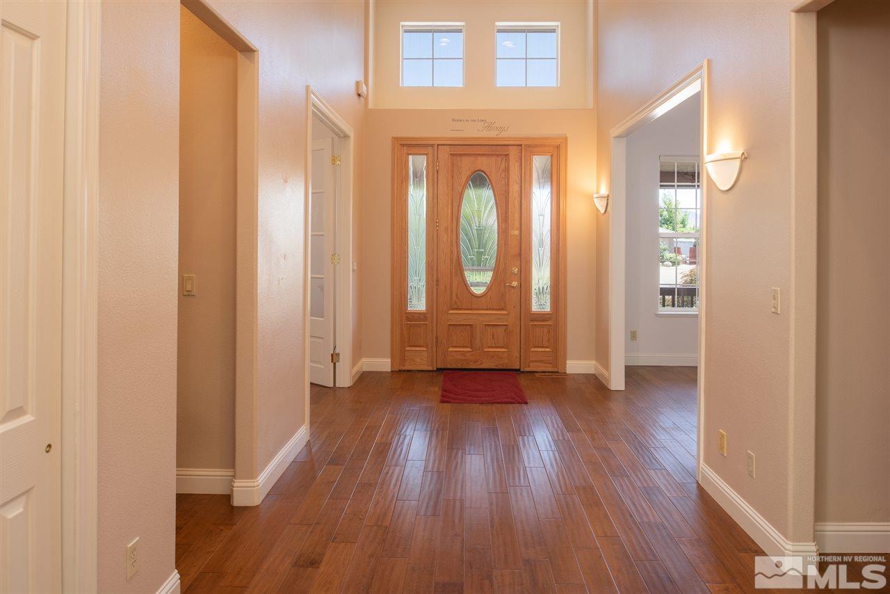 115 Gazelle Road Reno, NV 89511 - Photo 8 of 25 a view of an entryway with wooden floor