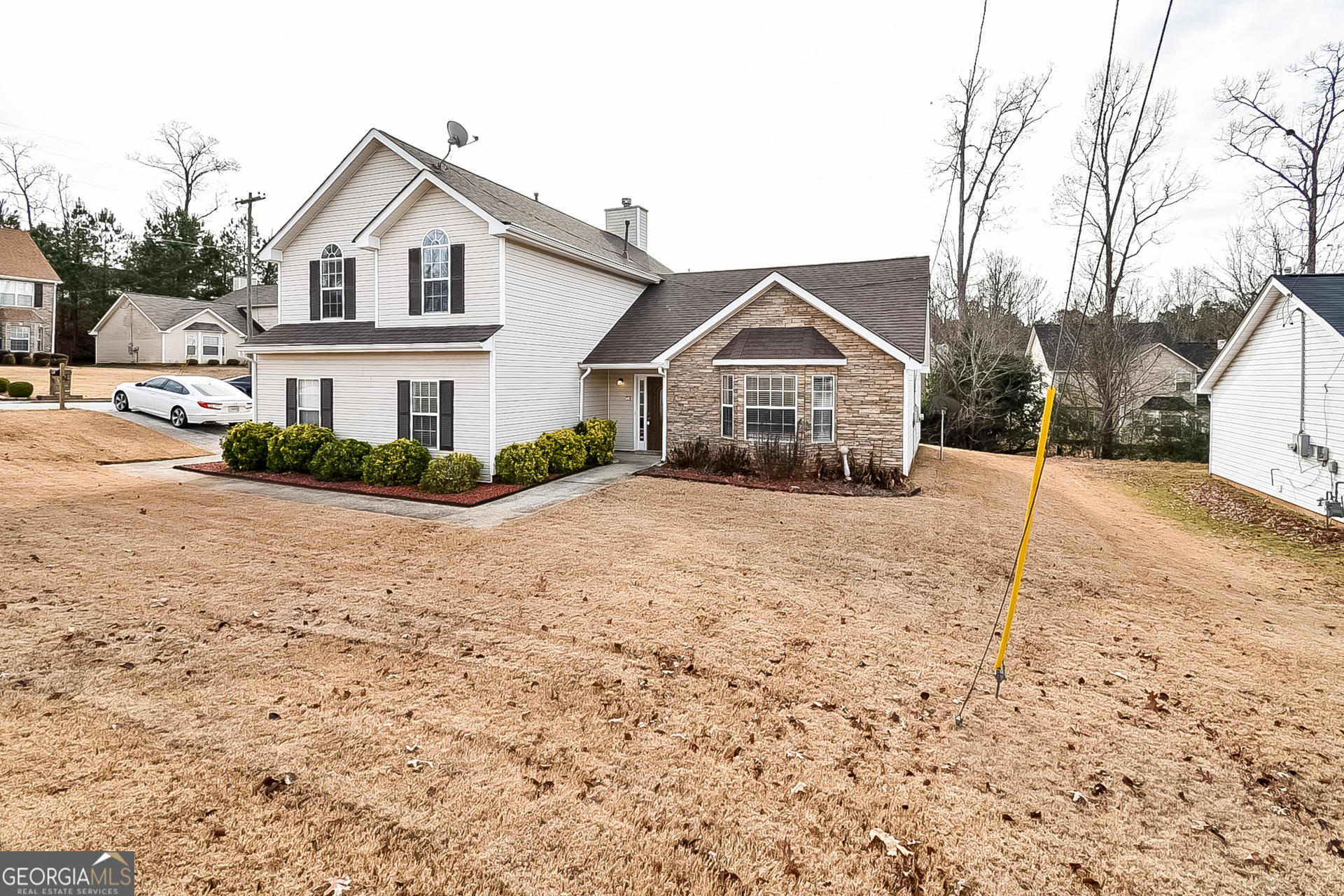 200 Teak Lane Fairburn, GA 30213 - Photo 2 of 17 a view of wooden house with a yard