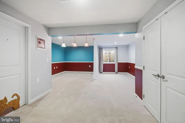 a bed room with a bed and a cabinets