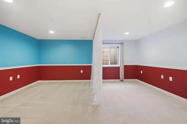 a room with furniture and window