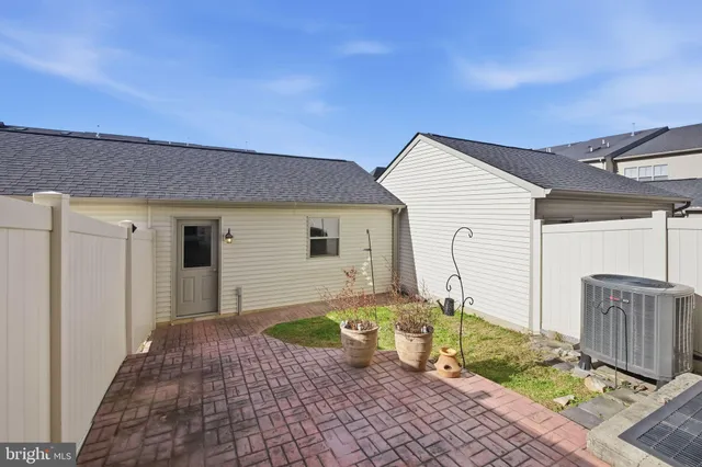 a house view with a backyard space