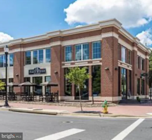 a front view of a building with street view