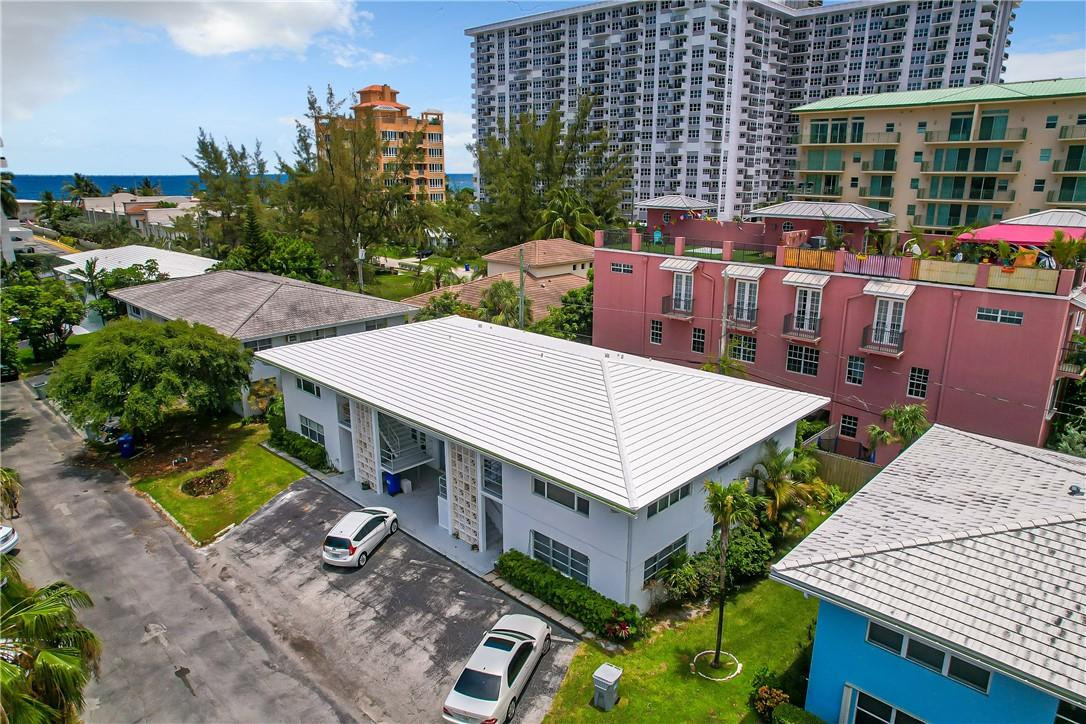 3208 Colony Club Road, Unit 2 Pompano Beach, FL 33062 - Photo 20 of 26 an aerial view of a house with balcony and outdoor space