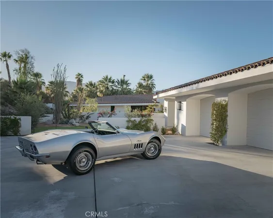 a car parked in front of a house