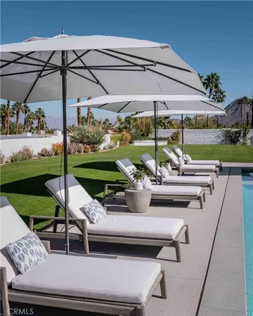 a kitchen with a table and chairs in it