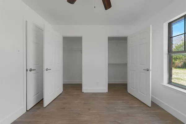 an empty room with windows