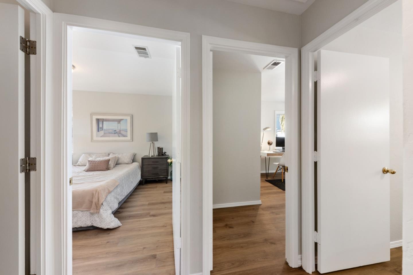 1155 Banyan Way Pacifica, CA 94044 - Photo 16 of 45 a bedroom with furniture and a wooden floor