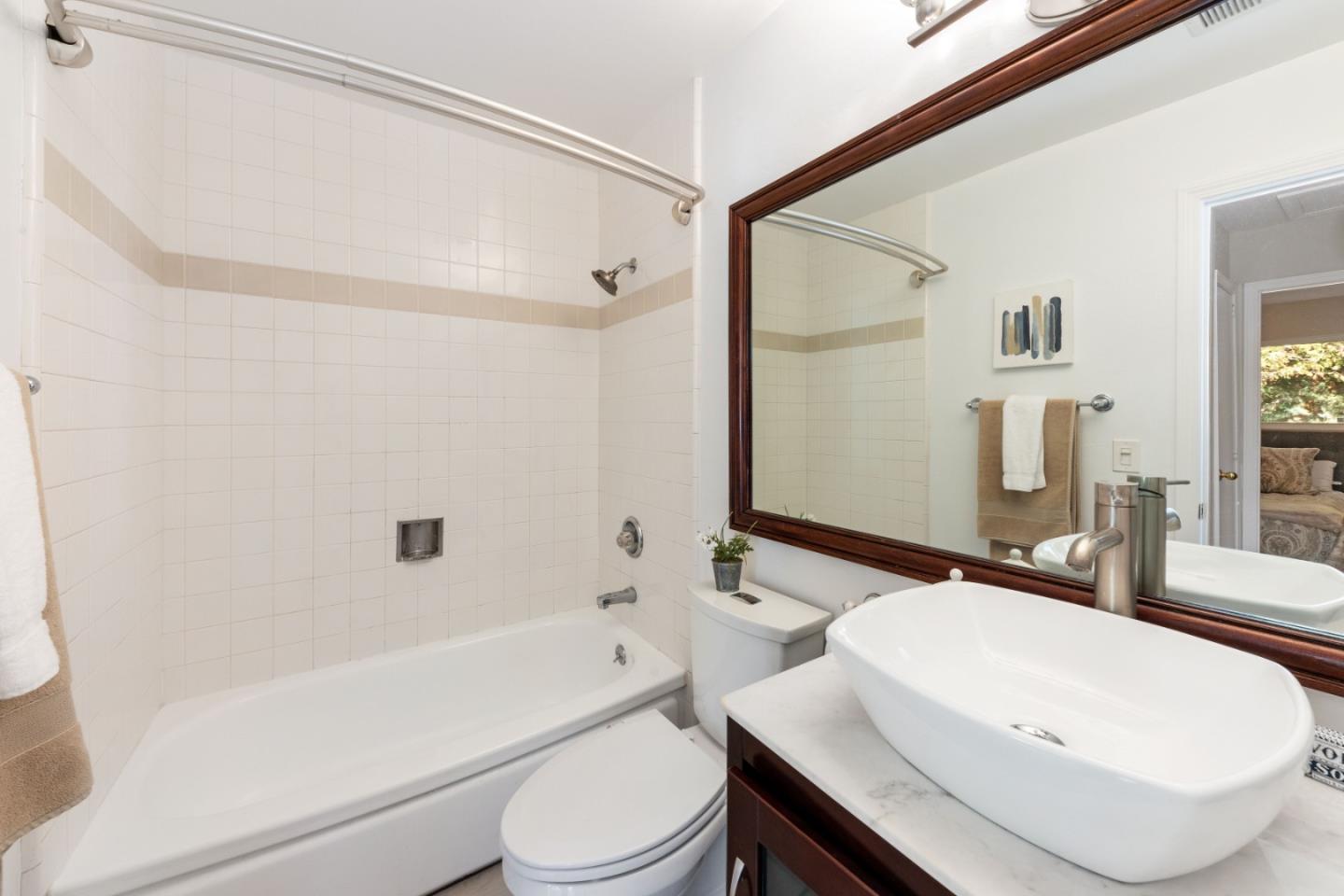 1155 Banyan Way Pacifica, CA 94044 - Photo 19 of 45 a bathroom with a sink a toilet and a bathtub