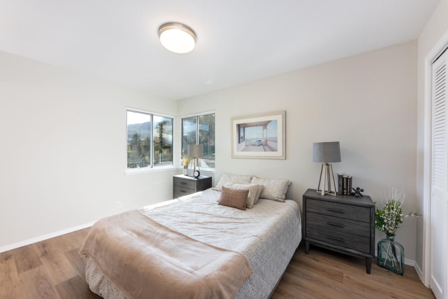 1155 Banyan Way Pacifica, CA 94044 - Photo 20 of 45 a bedroom with a bed and a window