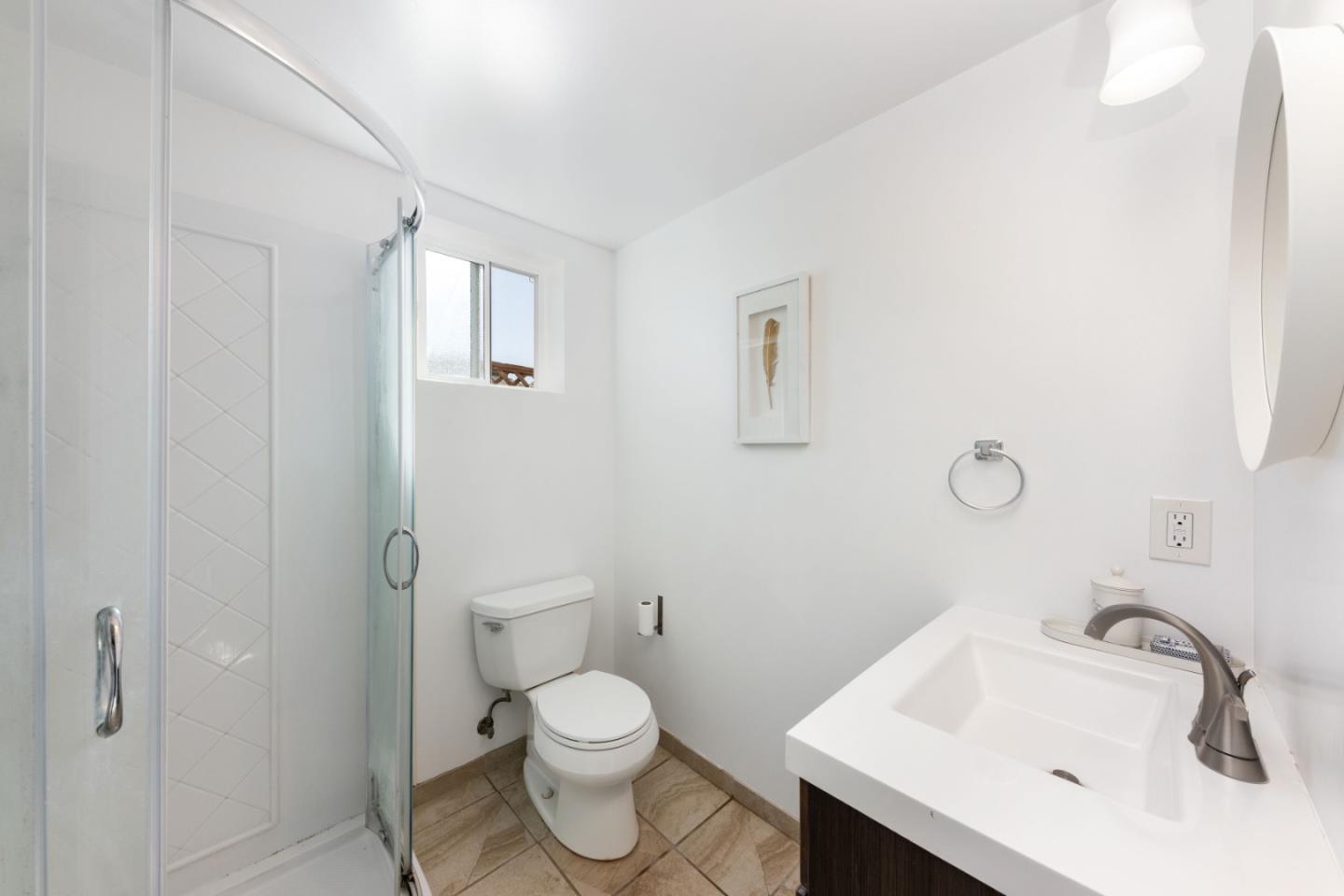 1155 Banyan Way Pacifica, CA 94044 - Photo 32 of 45 a bathroom with a sink toilet and shower