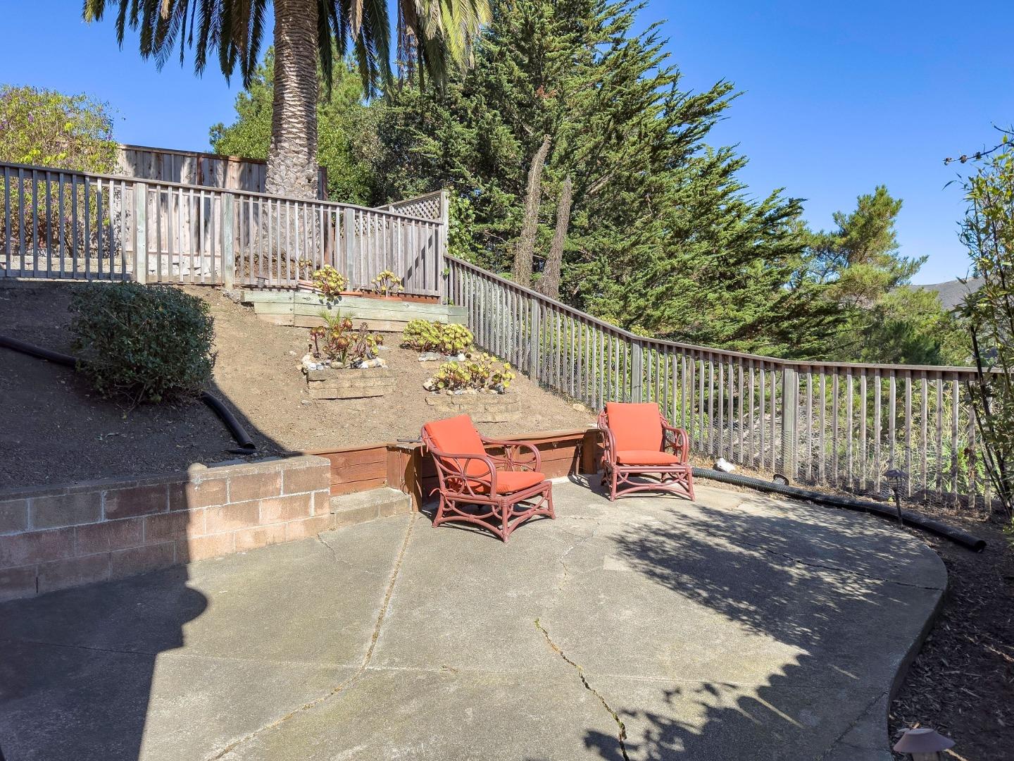 1155 Banyan Way Pacifica, CA 94044 - Photo 36 of 45 a view of a patio with a table and chairs