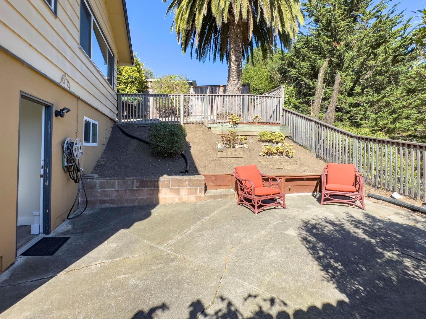 1155 Banyan Way Pacifica, CA 94044 - Photo 37 of 45 a roof deck with table and chairs