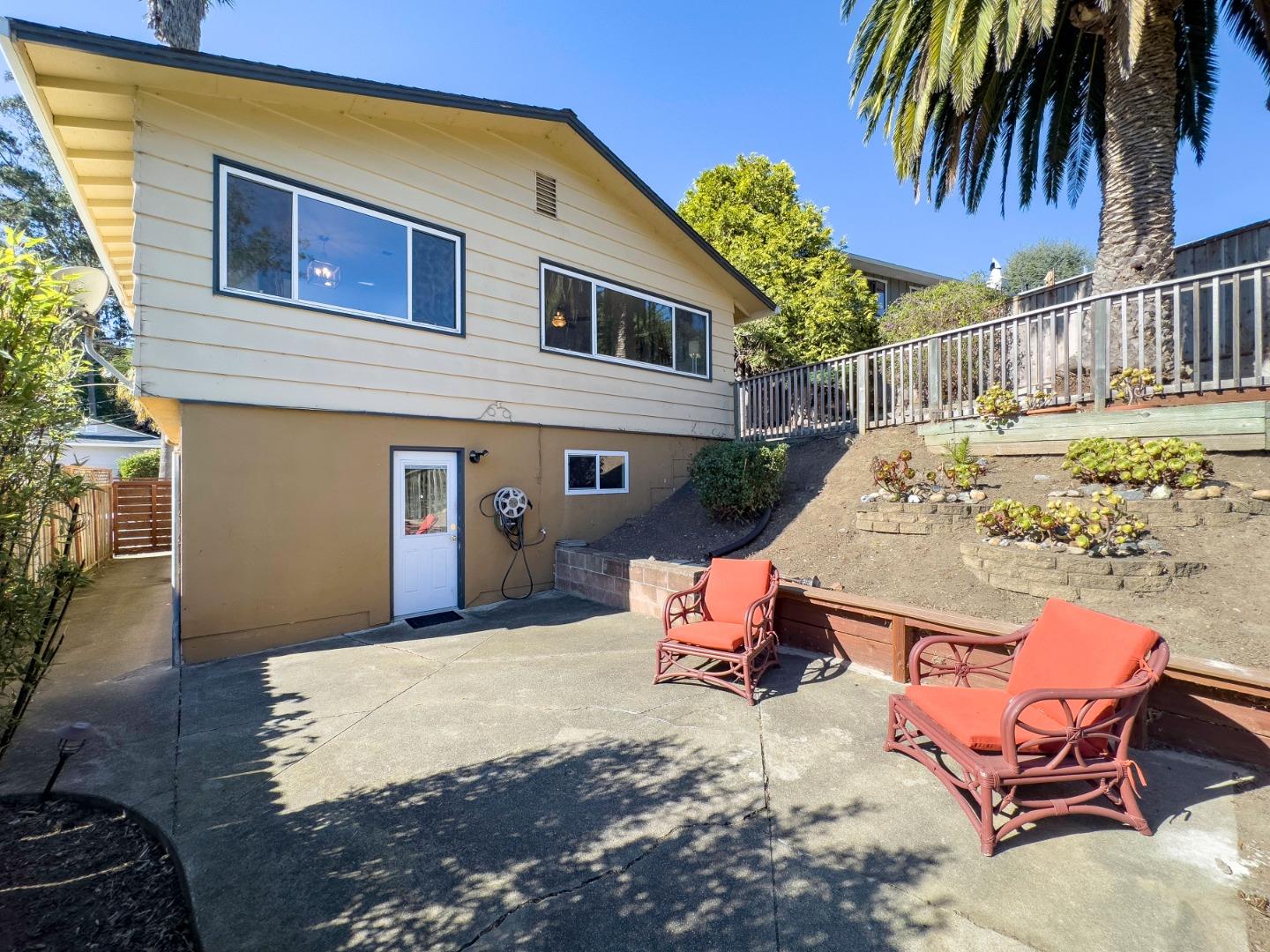 1155 Banyan Way Pacifica, CA 94044 - Photo 38 of 45 a backyard of a house with outdoor seating
