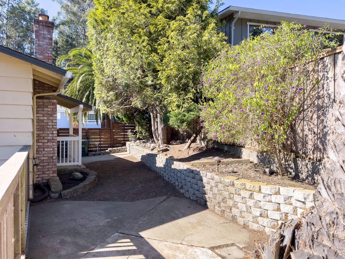1155 Banyan Way Pacifica, CA 94044 - Photo 41 of 45 a view of a backyard with sitting area