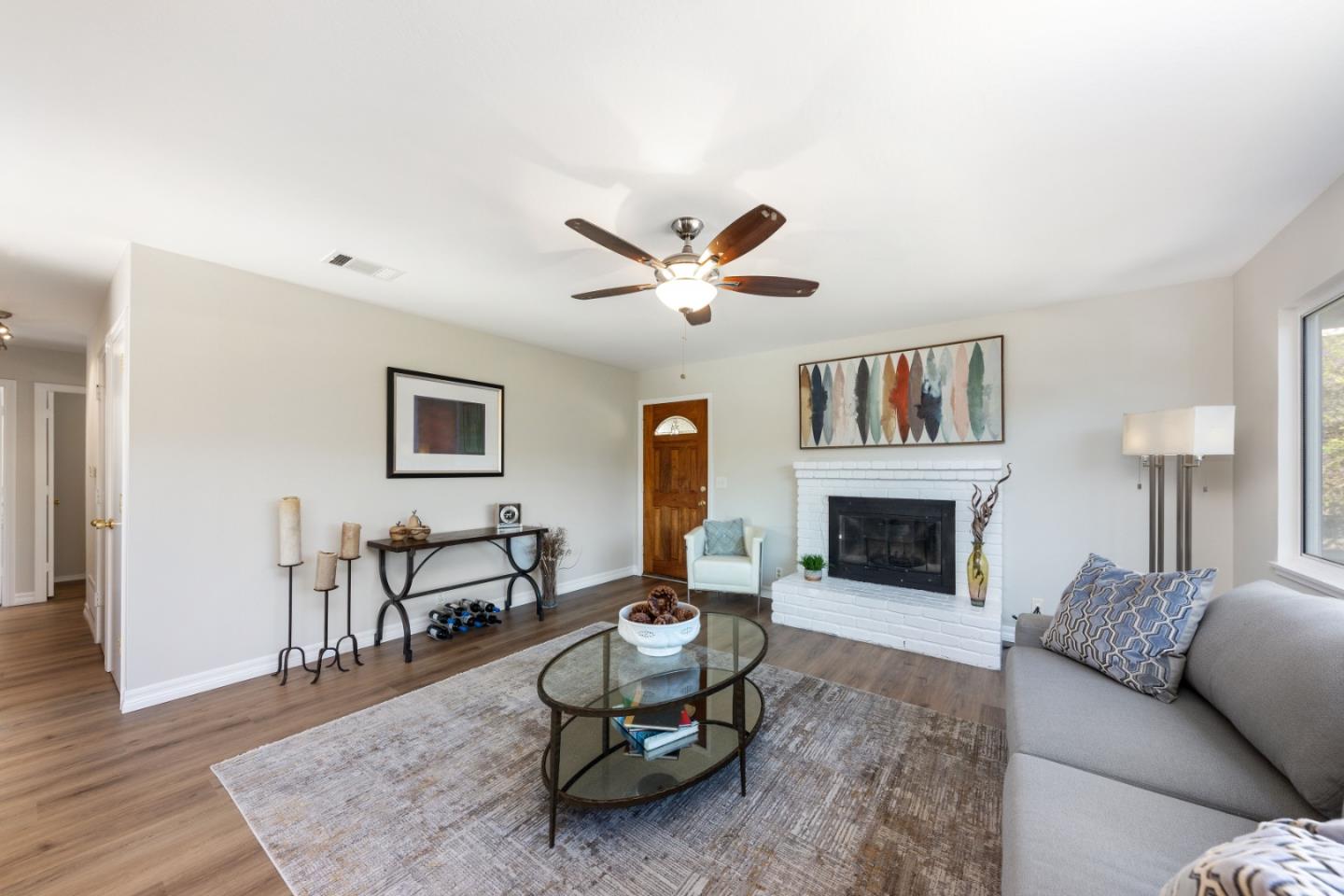 1155 Banyan Way Pacifica, CA 94044 - Photo 8 of 45 a living room with furniture and a fireplace