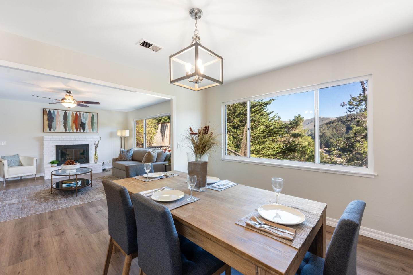 1155 Banyan Way Pacifica, CA 94044 - Photo 10 of 45 a view of a dining room with furniture wooden floor and chandelier